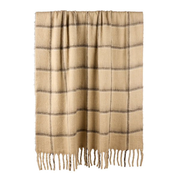 Beige plaid blanket with black lines and fringes on a white background