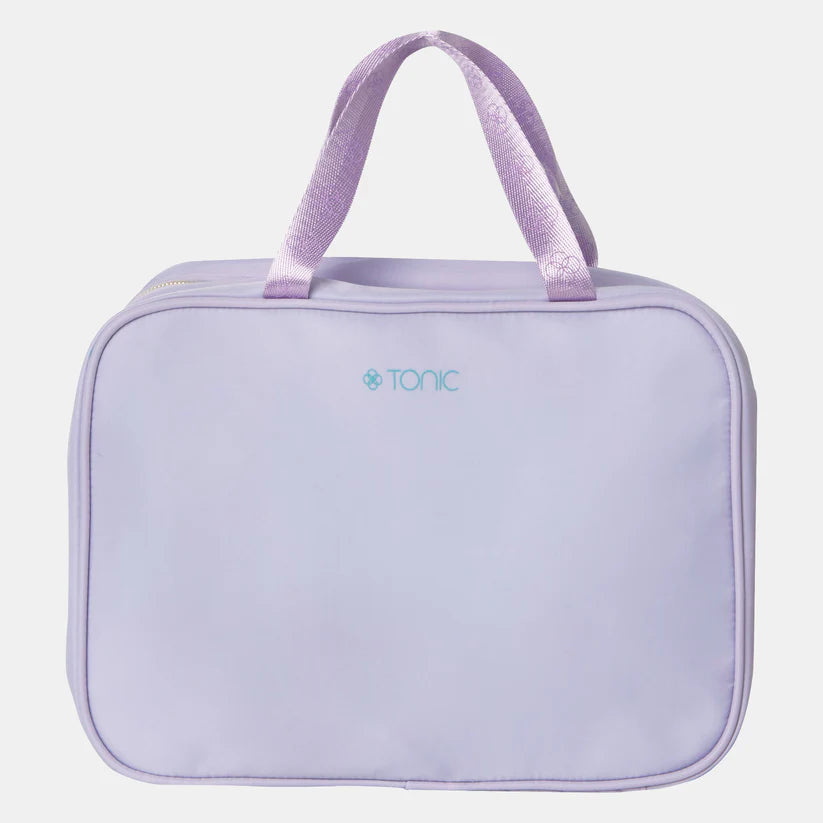 Lavender toiletry bag with handle on a light purple background