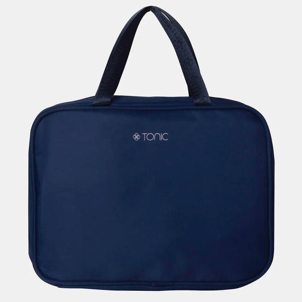 Navy blue bag with 'Tonic' logo on a light gray background